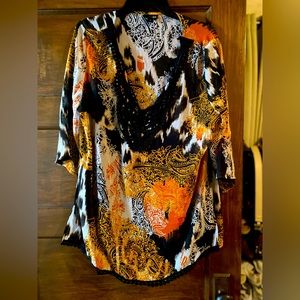 Nice, semi-sheer blouse with attached cami underneath